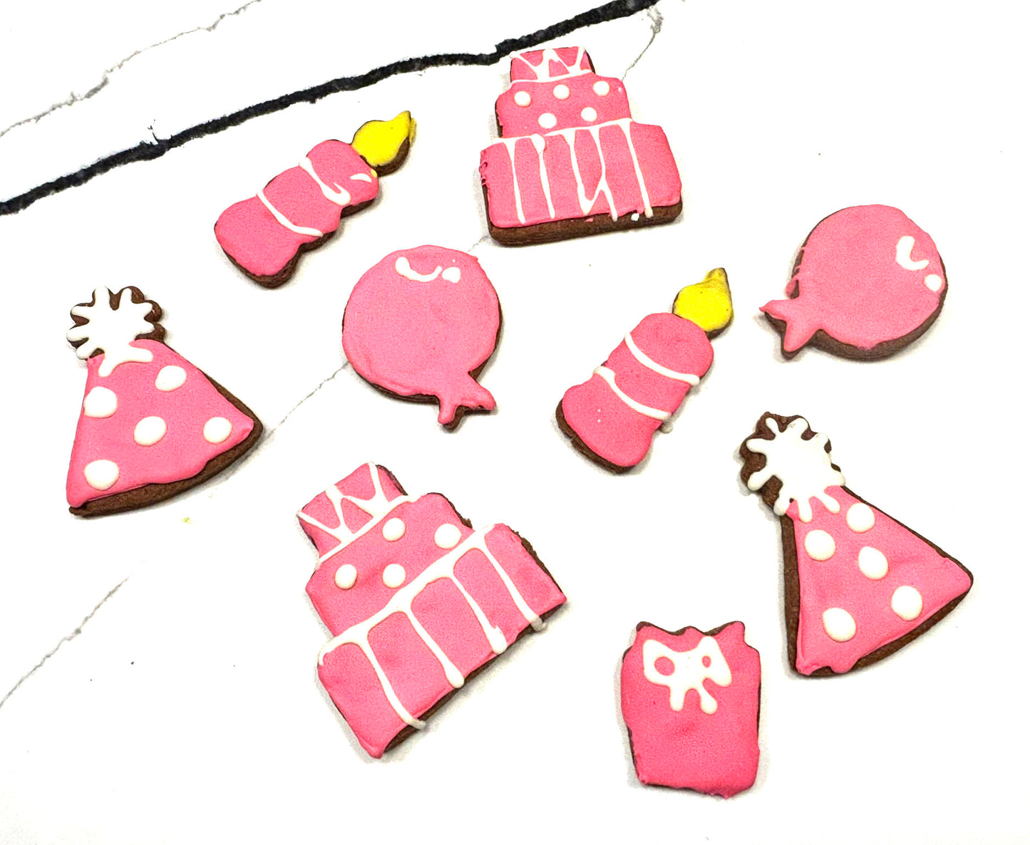 Organic birthday girl dog cookies in blue icing, handmade and perfect for pup celebrations.
