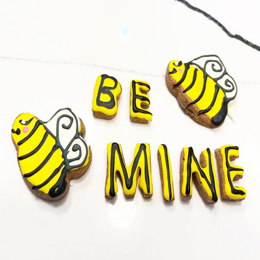 Dog Mom Valentine bone  shaped organic dog cookies hand-decorated in red and pink icing