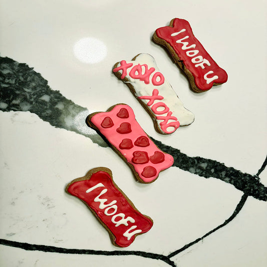 Dog Mom Valentine bone  shaped organic dog cookies hand-decorated in red and pink icing